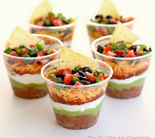 INDIVIDUAL MEXICAN 7-LAYER DIP with chips