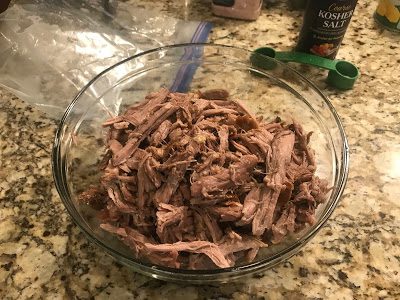 SLOW COOKER KALUA PORK SLIDERS FOR A CROWD